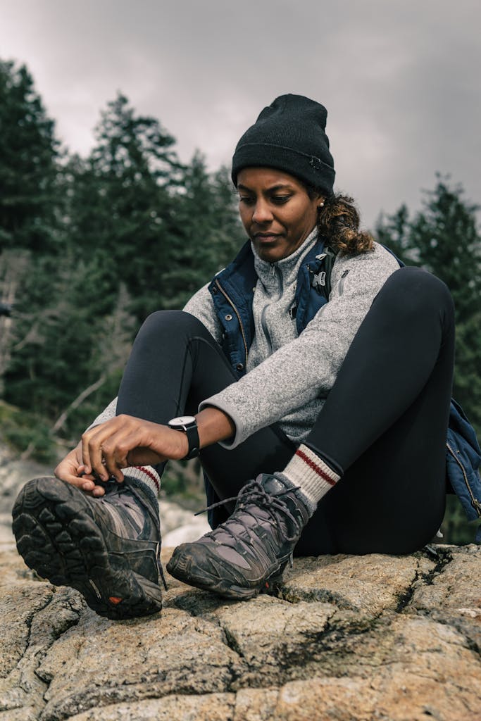 Woman Tying Her Shoelaces